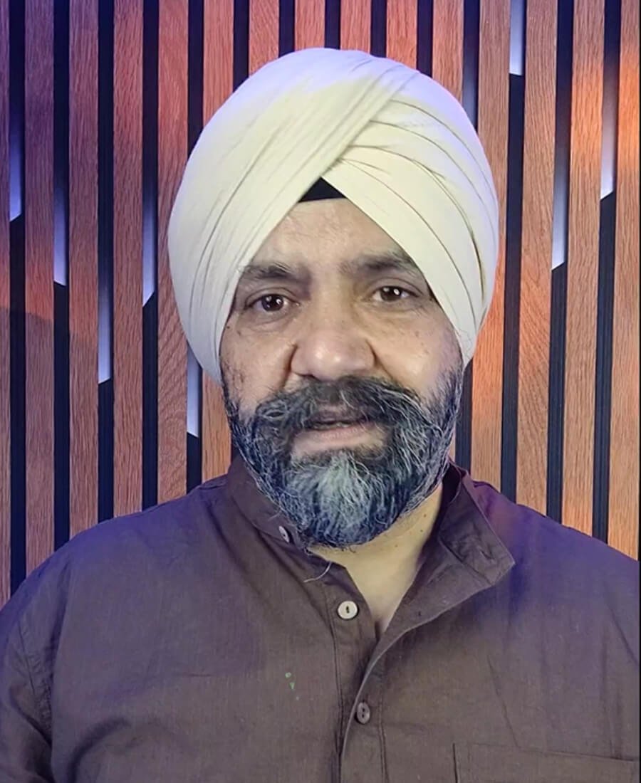 Vinay Singh Mediratta, founder of Be More Gurukul, seated in natural light